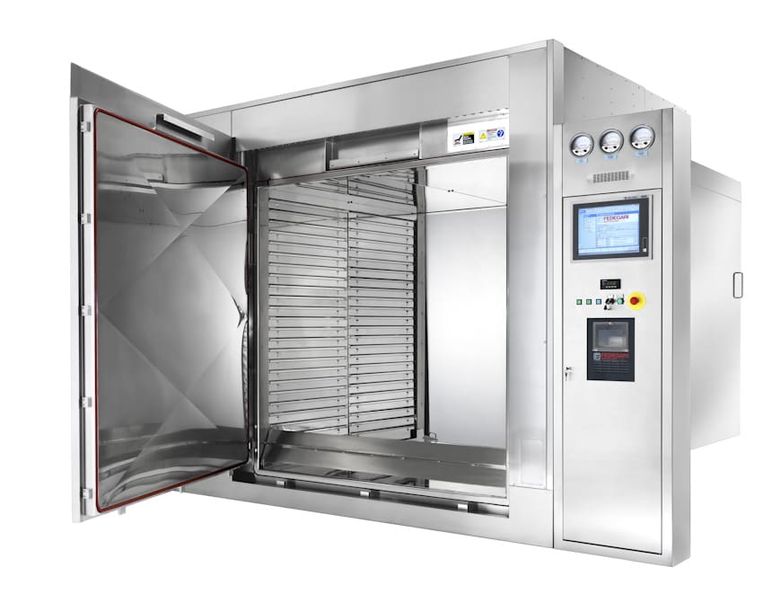 Commercial stainless steel oven with open door.