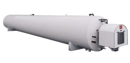 Long cylindrical storage tank with equipment.