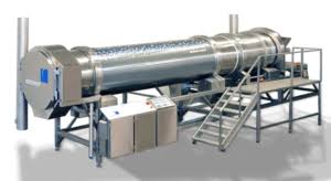 Industrial machine with metallic cylindrical design.