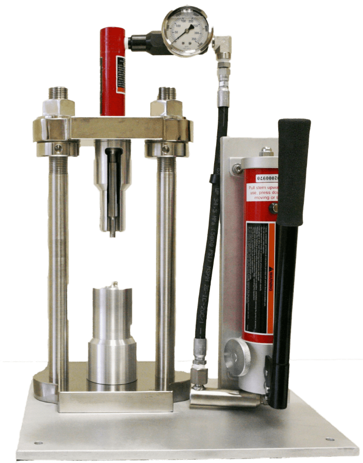 Hydraulic press with gauge and controls.