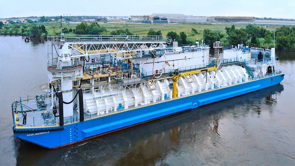 Large blue and white dredging vessel