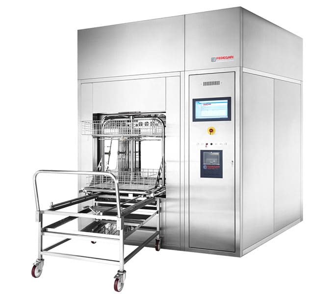Stainless-steel industrial sterilizer with loading cart